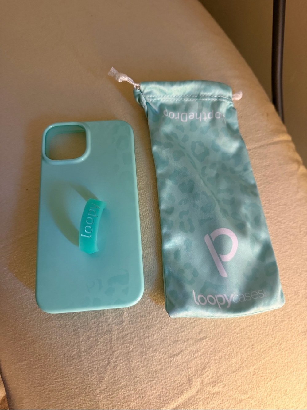 Loopy iPhone 14 Teal Animal Print Phone Case with Teal Loop and Pouch